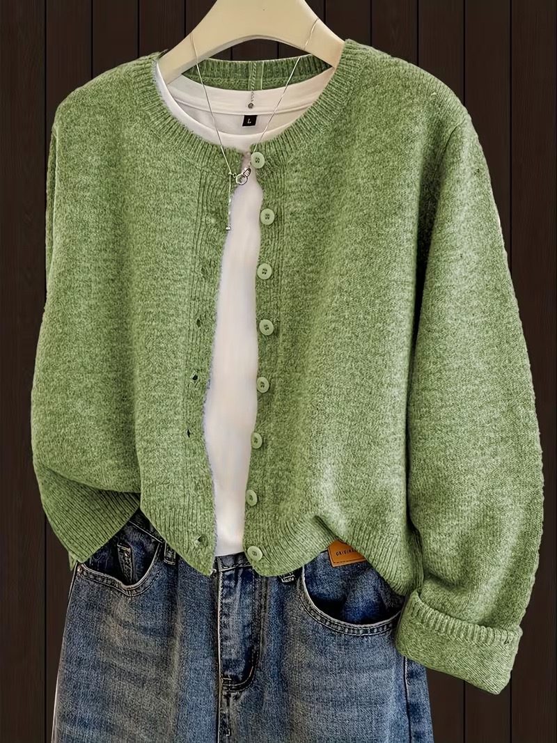 Green button cardigan with a soft knit texture